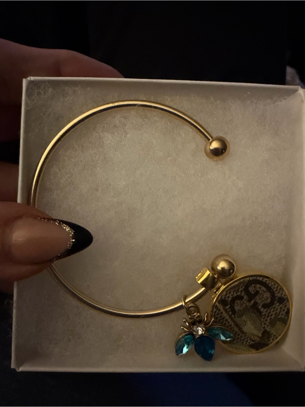 Gold-Tone Open Bangle Bracelet with Authentic Gucci andBlue Crystal Flower Charm